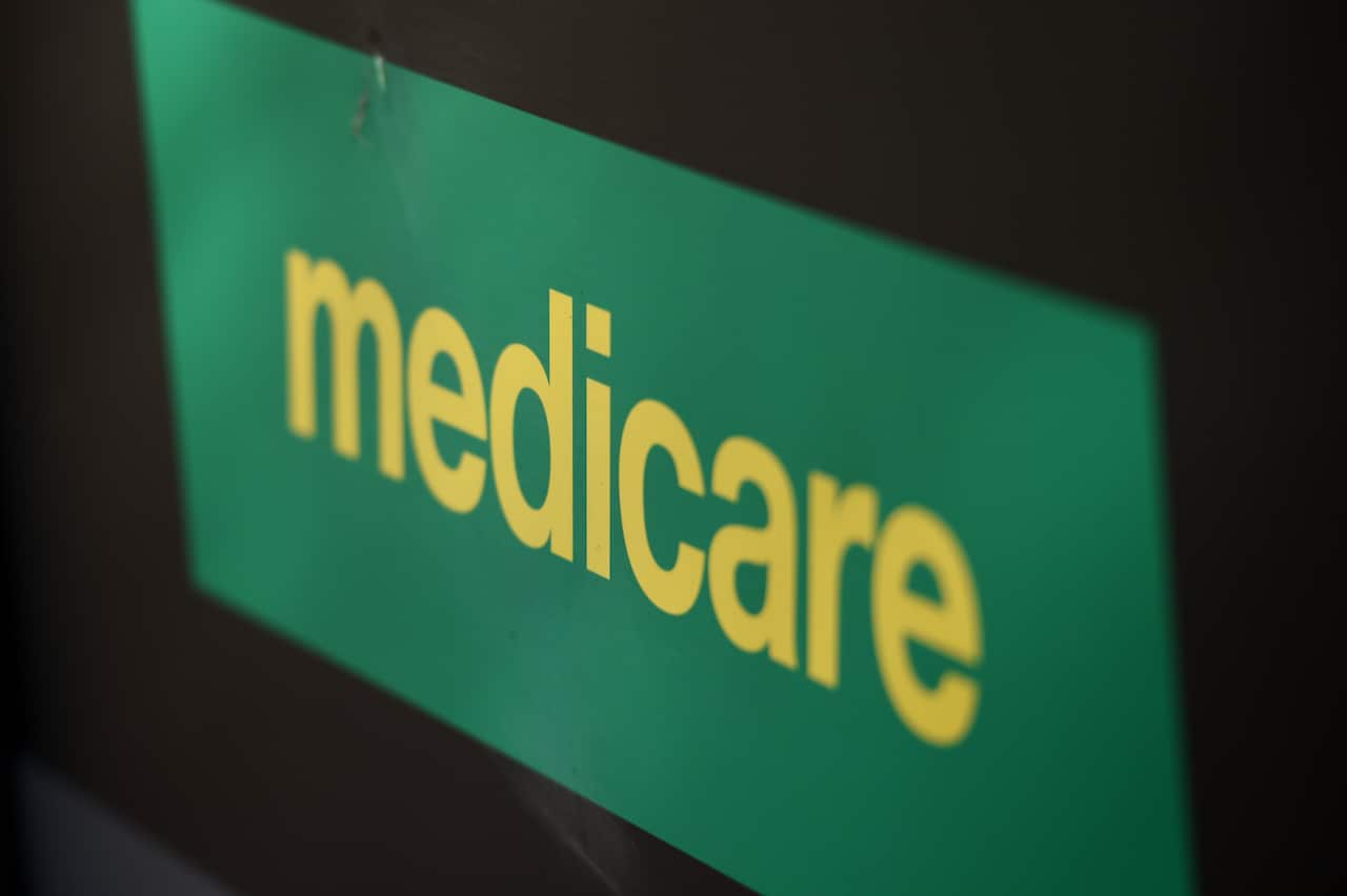 Medicare signs in Melbourne, Saturday, June, 25, 2016. (AAP Image/Tracey Nearmy) NO ARCHIVING