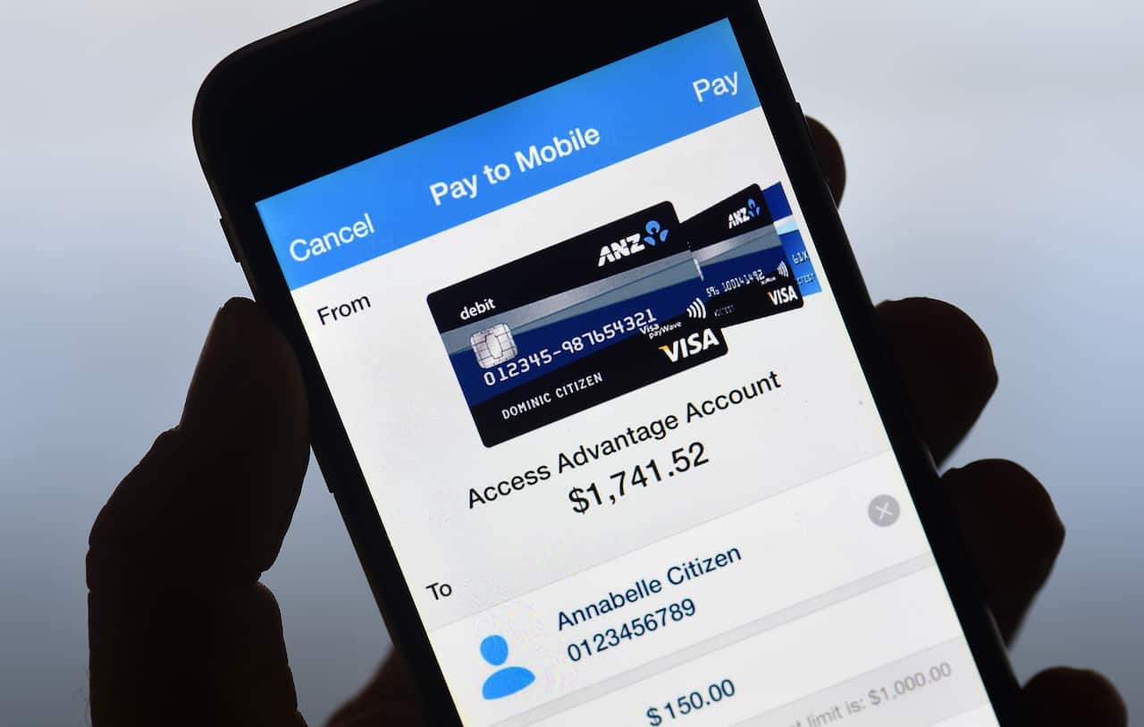  ANZ Bank product is seen on a mobile device in Brisbane, Wednesday, Oct. 5, 2016. A three-day parliamentary inquiry into banking is underway, with Chief executives from Australia's four biggest banks appearing to answer questions over a string of scandal