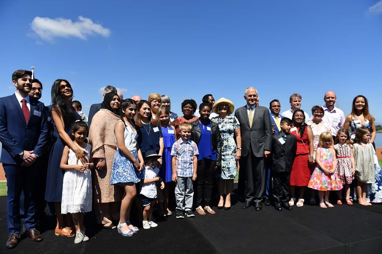 Prime Minister Malcolm Turnbull poses for a photo with new Australian citizens at an Australia Day Citizenship Ceremony and Flag Raising event in Canberra, Thursday, Jan. 26, 2017. (AAP Image/Mick Tsikas) NO ARCHIVING