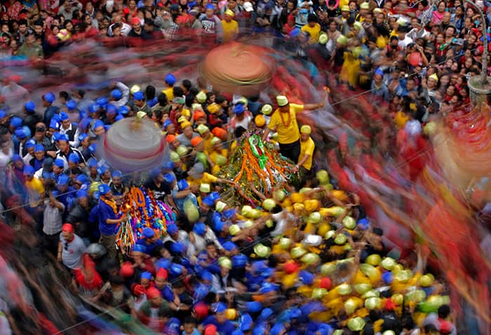 Three different chariots of Hindu deities Kankeshwori, Shankata and Bhadrakali are taken through the streets during the festival celebrated by Nepal's Newar Community.