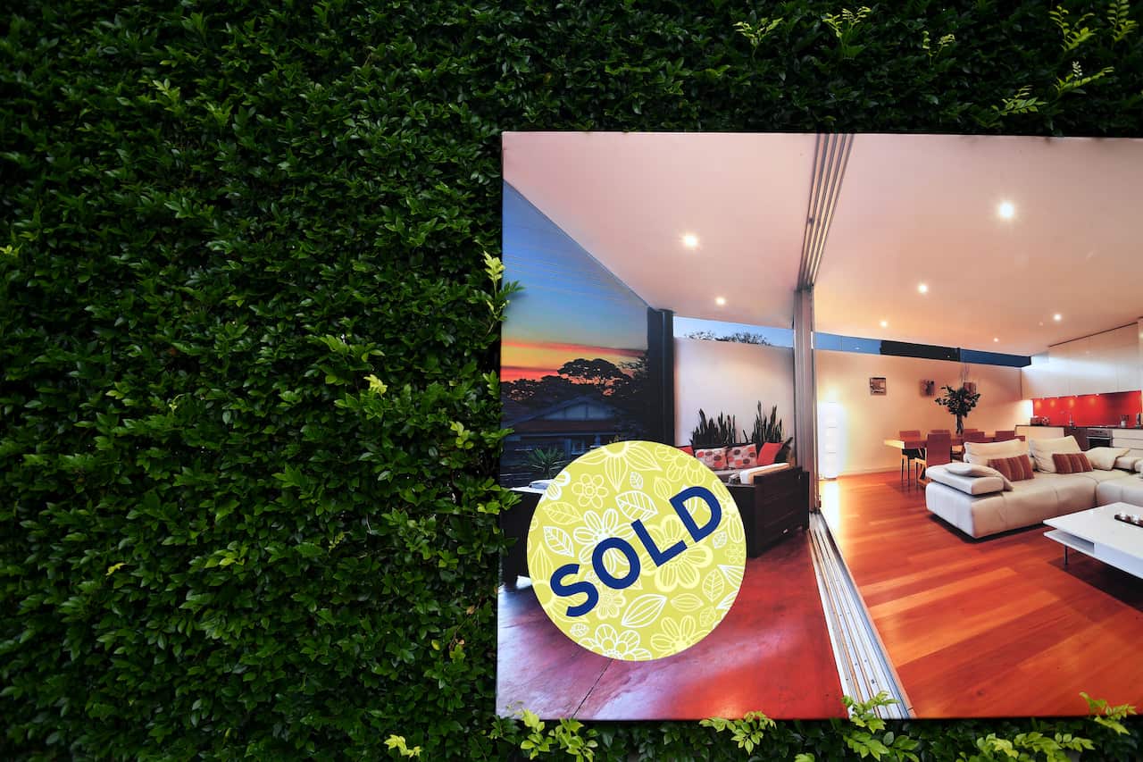 A for sale sign is displayed in front of a house in Sydney on Wednesday, April 26, 2017. (AAP Image/Paul Miller) NO ARCHIVING