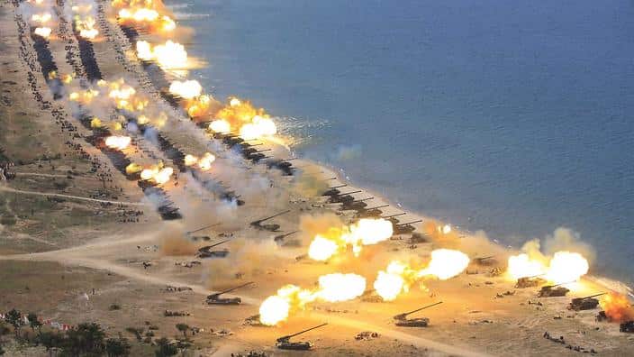 An undated photograph released by the Korean Central News Agency (KCNA) on 26 April 2017 shows a combined fire demonstration of North Korean artillery.