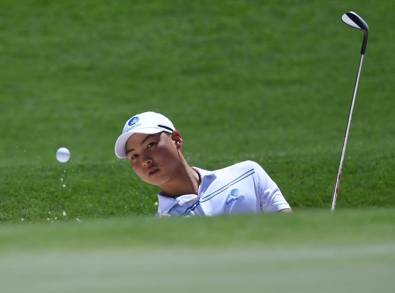 Min Woo Lee of Australia plays from the bunker at the first hole during round 3 of the Australian Open Golf Championship at The Australian Golf Club in Sydney, Saturday, November 25, 2017. (AAP Image/David Moir) NO ARCHIVING, EDITORIAL USE ONLY