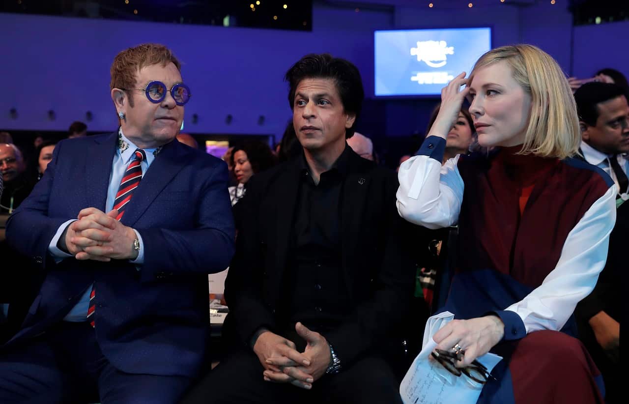 Elton John, Shah Rukh Khan and Cate Blanchett, at the World Economic Forum in Davos, Switzerland, Monday, Jan. 22, 2018.