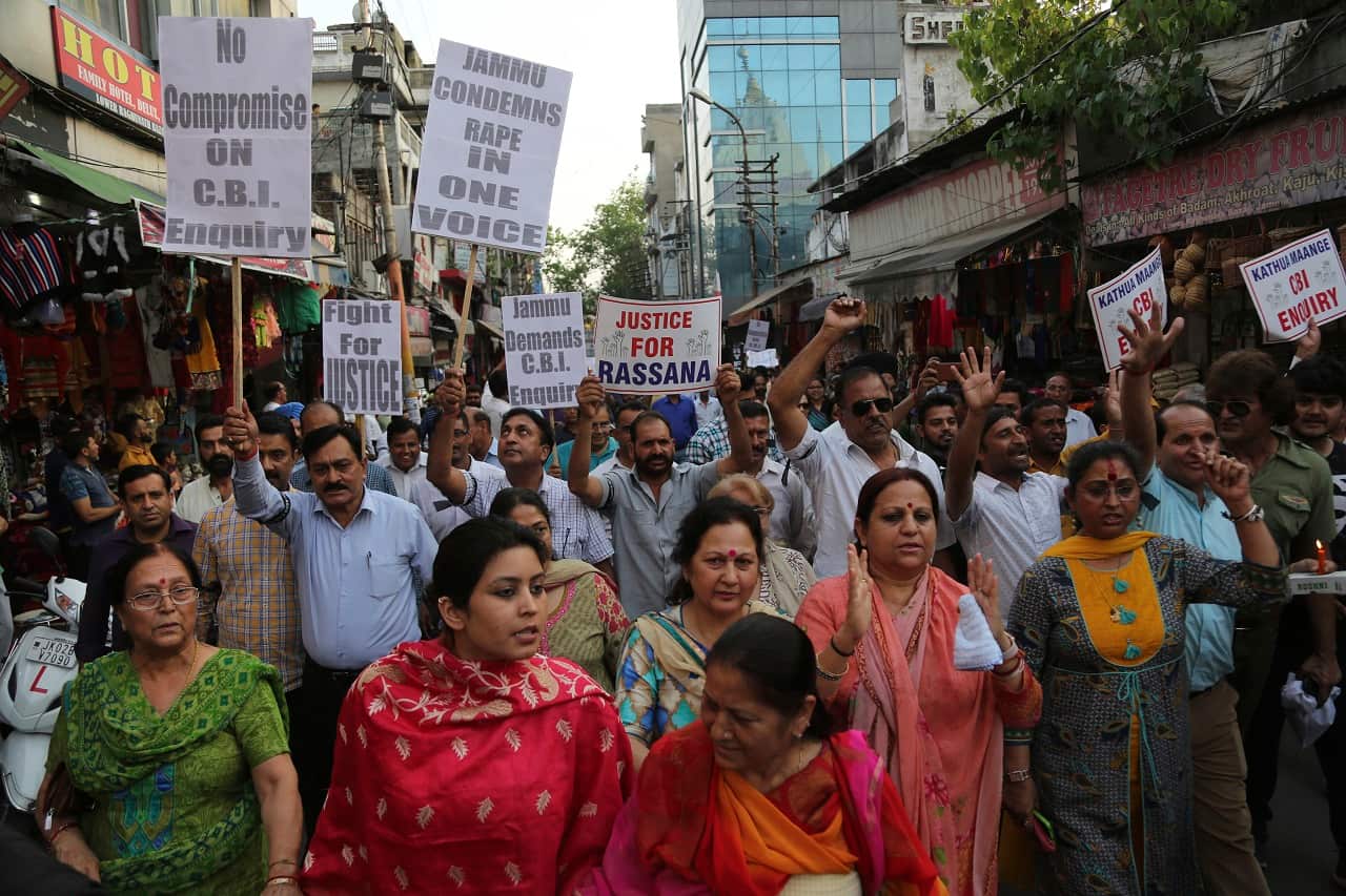 Protestors demand the investigation into the rape and murder of 8-year-old girl to be handed over to the Central Bureau of Investigation (CBI).