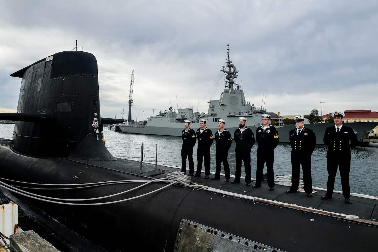 Navy personal stand on the HMAS Waller, one of six Collins class submarines of the Navy's Force Element Group, in Sydney, Wednesday, May 2, 2018. (AAP Image/Brendan Esposito) NO ARCHIVING