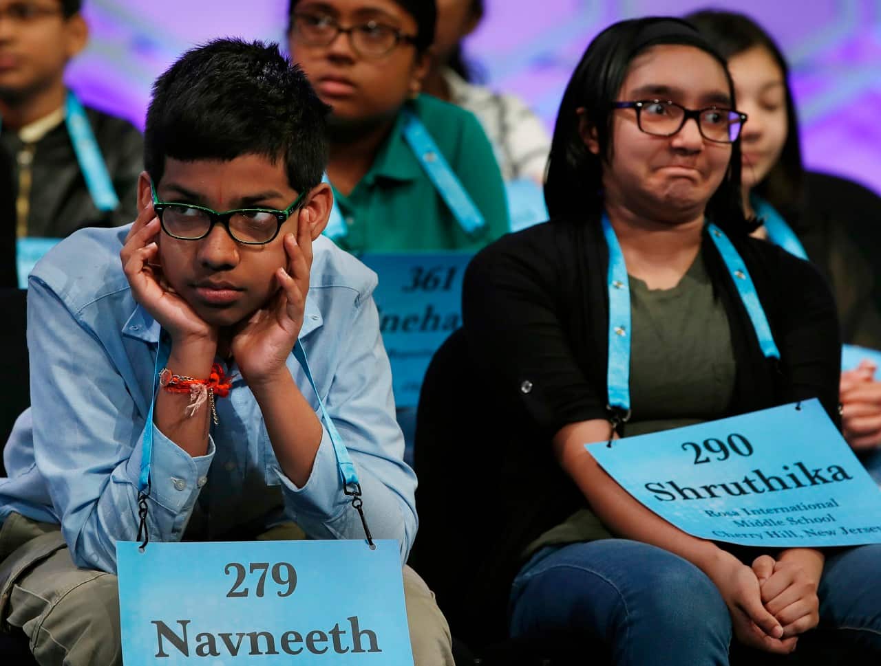 Navneeth Murali, 12, from Edison, NJ, left, and Shruthika Padhy, 12, from Cherry Hill, NJ in the Scripps National Spelling Bee in Oxon Hill, Md.