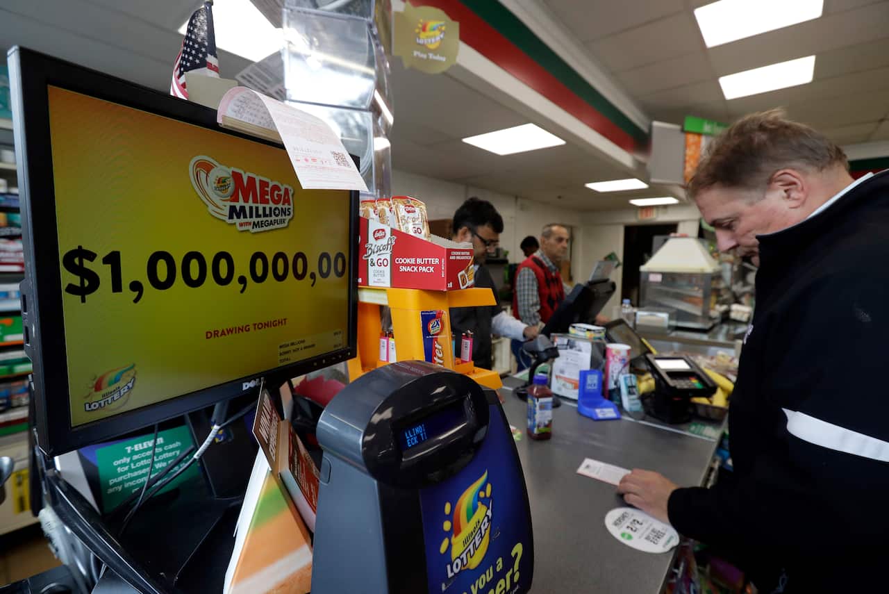 A sign displays the estimated Mega Millions jackpot at a convenience store in Chicago