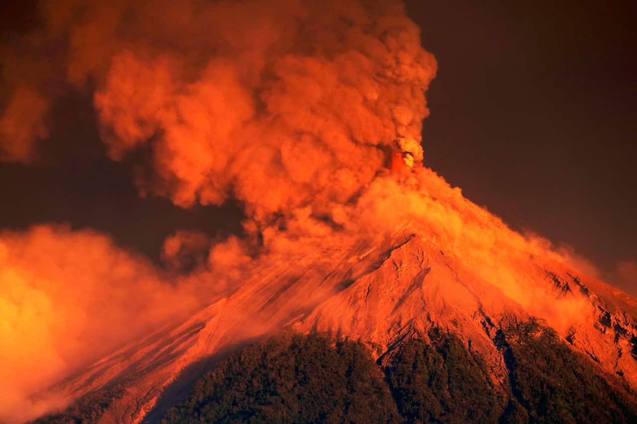 the Fuego volcano eruption at sunrise, seen from El Rodeo, Escuintla, Guatemala, 