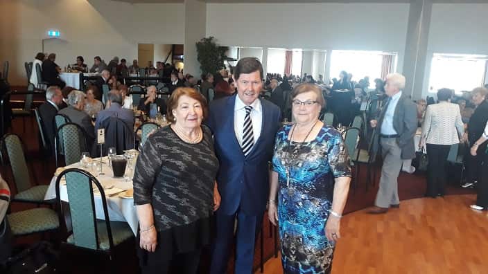 Federal Liberal MP Kevin Andrews with a couple of Greek ladies-members of the Federation of the Greek Elderly Clubs of Victoria at the Christmas Celebration