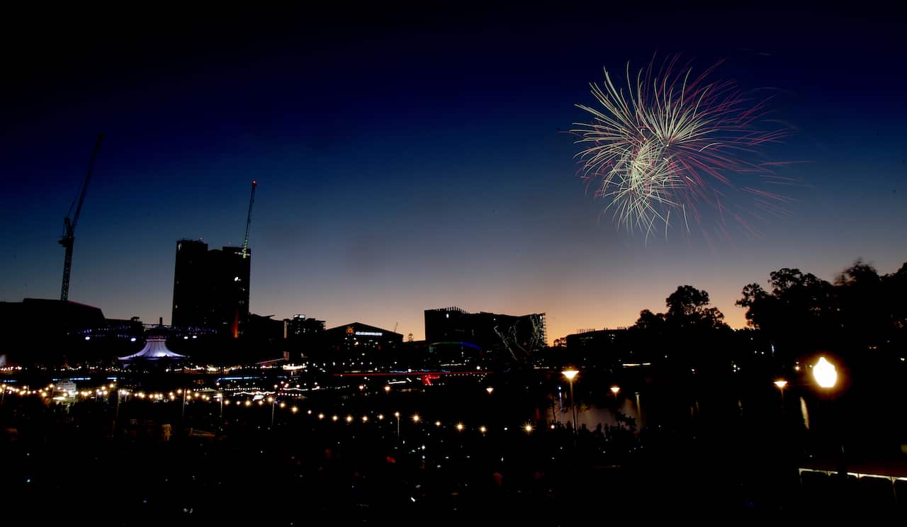 Fireworks are seen over Elder Park during New Year's Eve celebrations in Adelaide, Monday, December 31, 2018. (AAP Image/Kelly Barnes) NO ARCHIVING