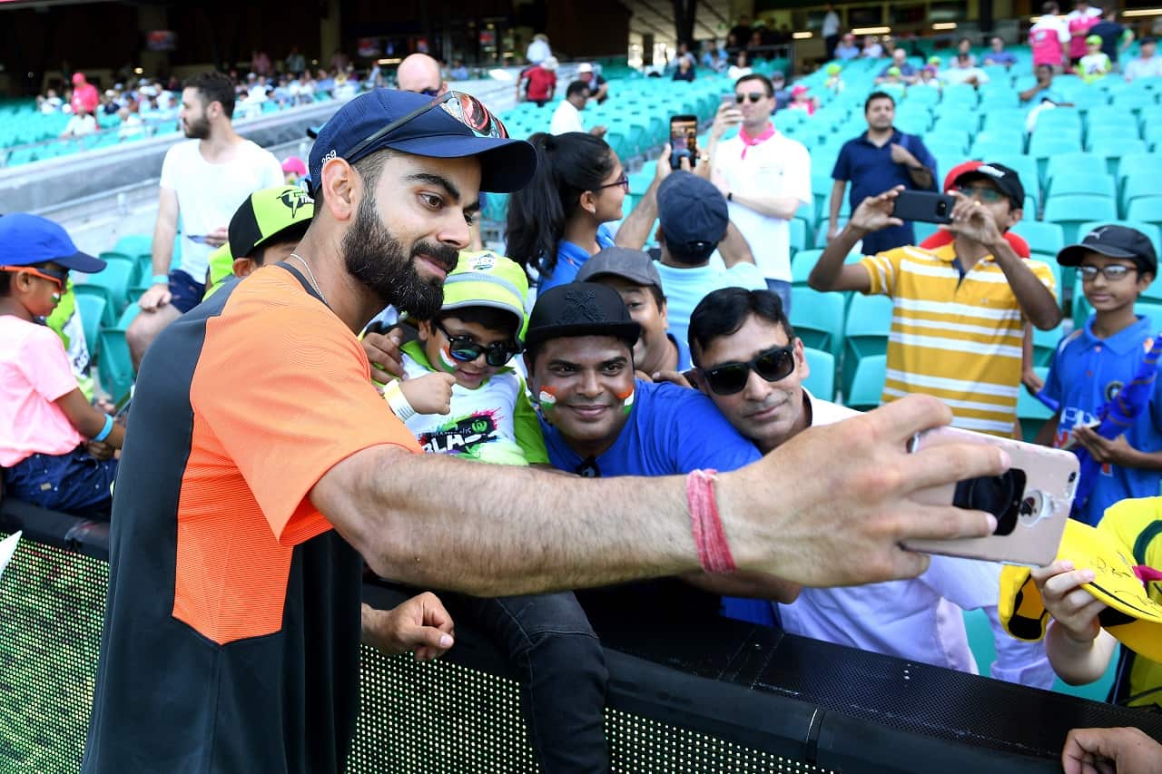Virat Kohli poses for selfies on day two of the Fourth Test match between Australia and India at the SCG in Sydney, Friday, January 4, 2019.