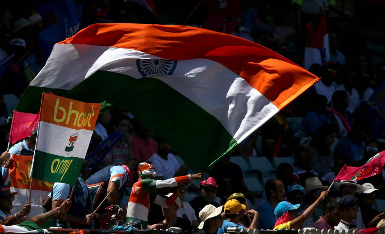 Indian cricket fans wave flags on day 2 the cricket test match between India and Australia in Sydney, Friday, Jan. 4, 2019. 