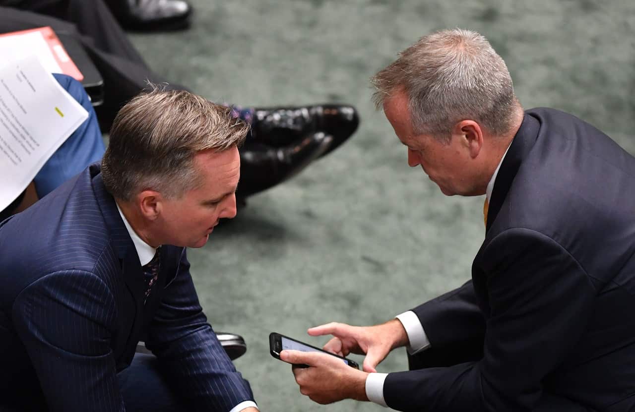 Chris Bowen and Bill Shorten during Question Time in the House of Representatives at Parliament House in Canberra, Tuesday, February 19, 2019.