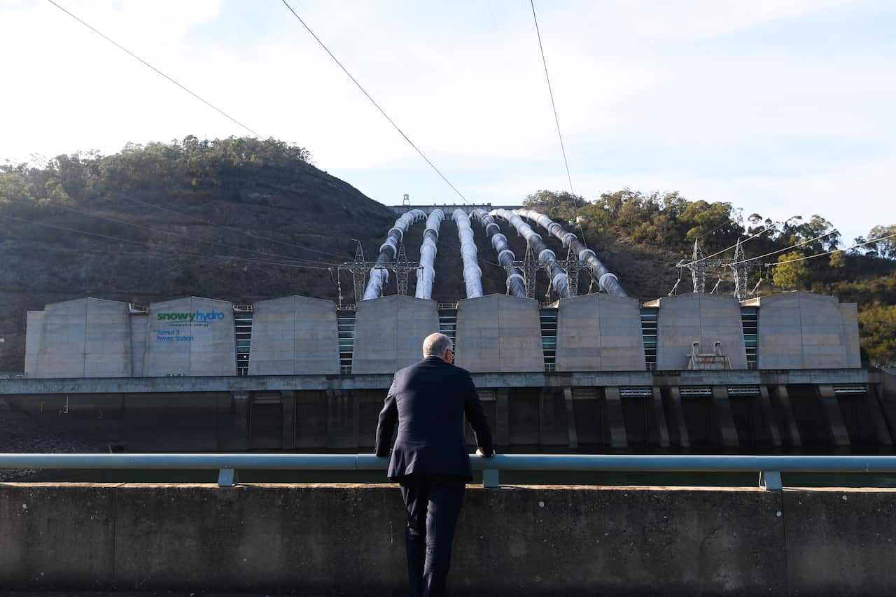 POOL Australian Prime Minister Scott Morrison poses for photographs in front of the Tumut 3 power station at the Snowy Hydro Scheme in Talbingo, Tuesday, February 26, 2019. Scott Morrison announced today a further $1.3 billion investment into the Snowy Hy
