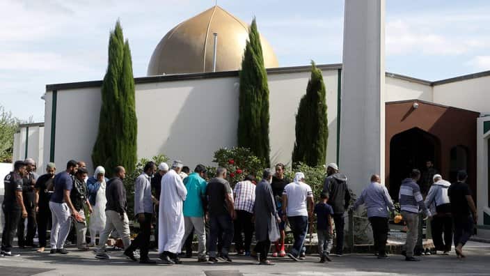 In this Saturday, March 23, 2019 file photo, Worshippers prepare to enter the Al Noor mosque following last week's mass shooting in Christchurch, New Zealand.