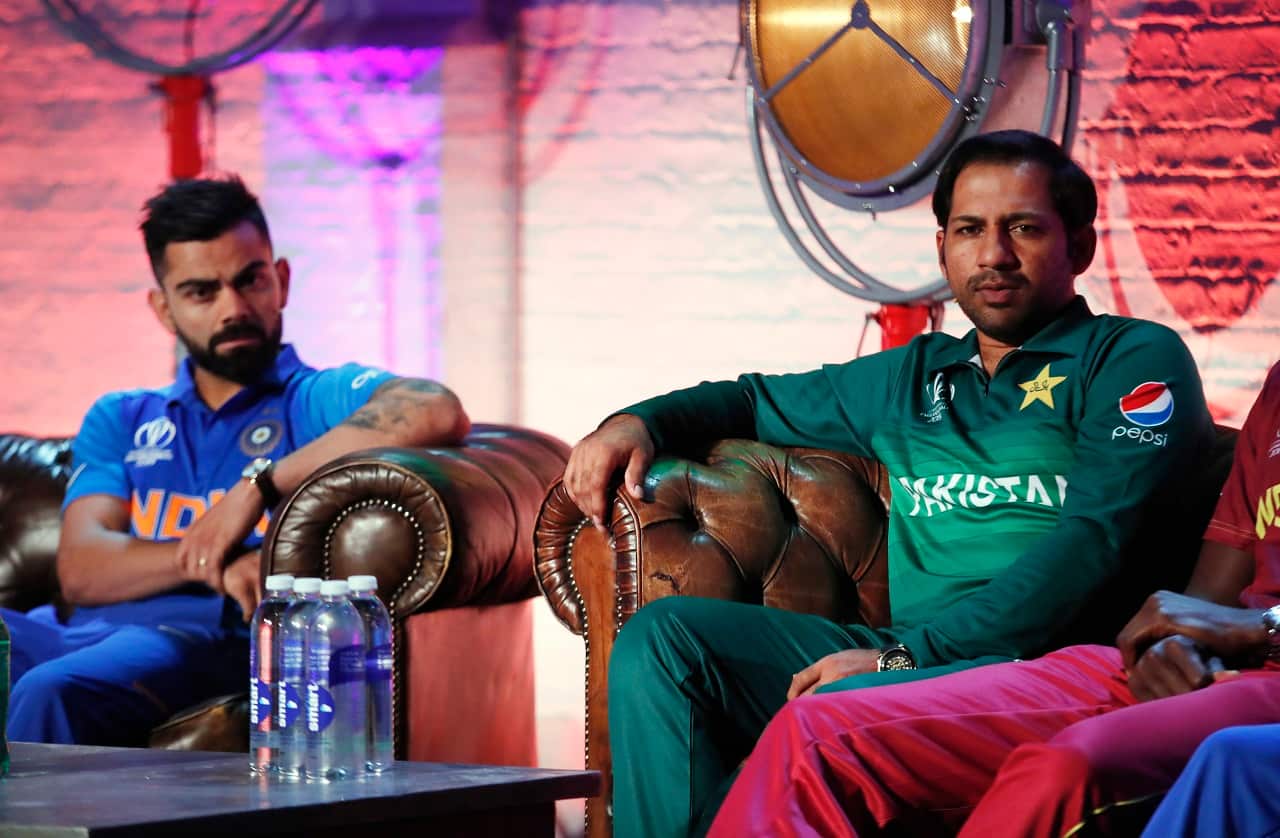 Pakistan's Sarfaraz Ahmed, right and India's Virat Kohli, May 23, 2019. The Cricket World Cup starts on Thursday May 30. (Andrew Boyers/Pool Photo via AP)