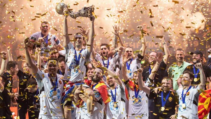 02 June 2019, North Rhine-Westphalia, Cologne: Vardar's Igor Karacic holds up the trophy after winning the EHF Champions League final Handball match between Vardar Skopje and Telecom Veszprem. Photo: Marius Becker/dpa