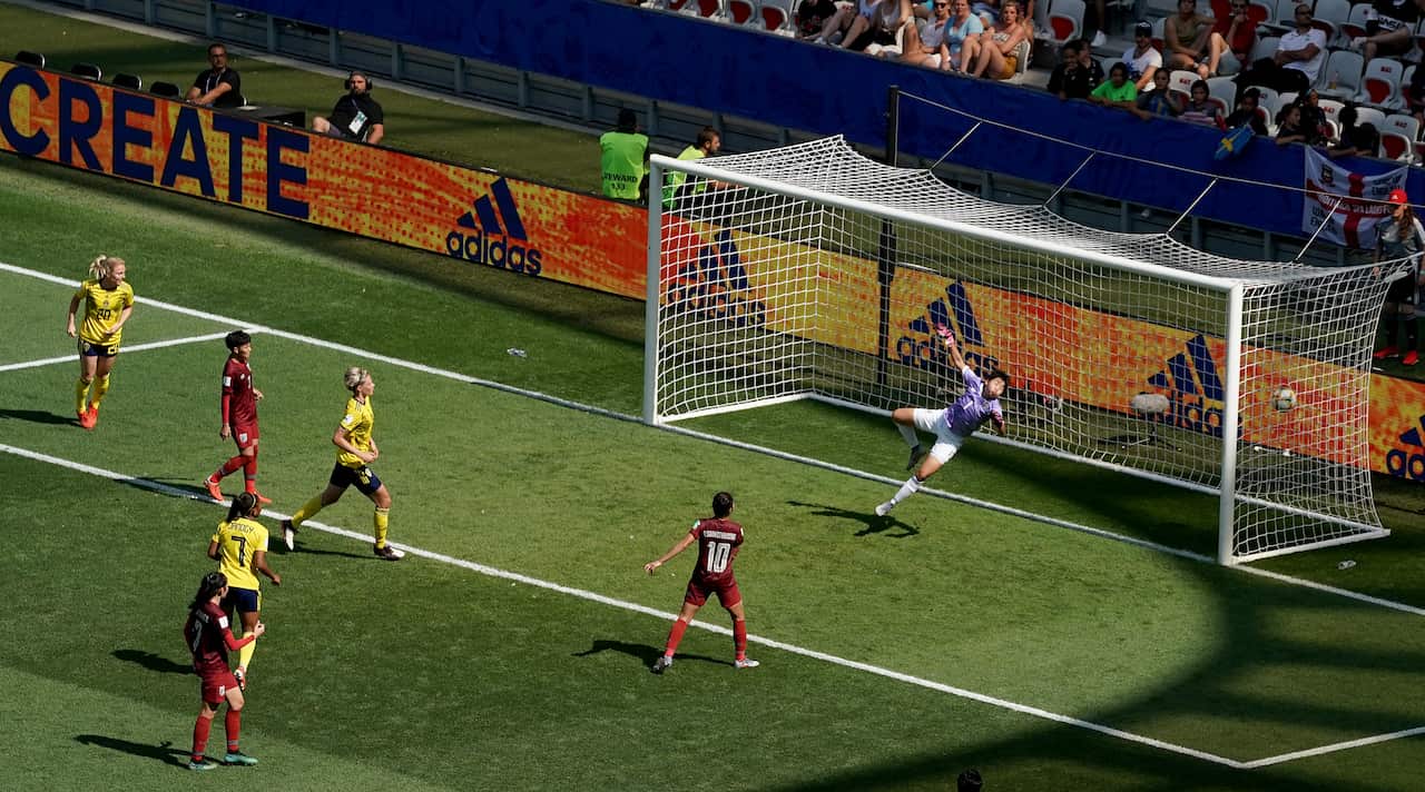 Sweden's Lina Hurtig scores her side's fourth goal of the game.
