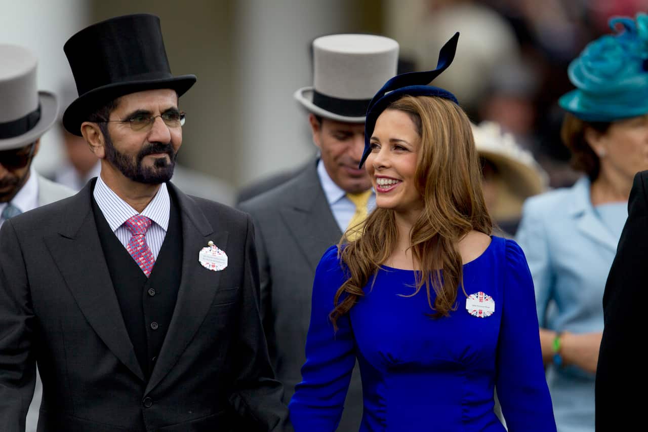 , June 20, 2012 file photo, Sheikh Mohammed Al Maktoum and his wife Princess Haya of Jordan 