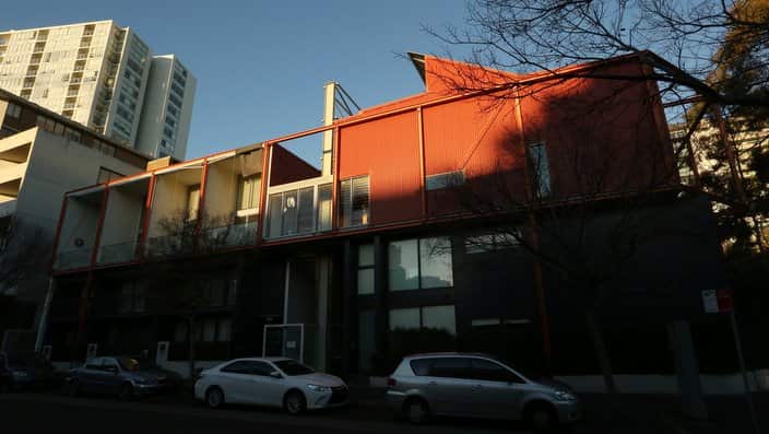 The Zetland Apartments are seen in Sydney, Wednesday, July 10, 2019. Water and fire defects caused the building to be secretly abandoned 8 months ago. (AAP Image/Danny Casey) NO ARCHIVING