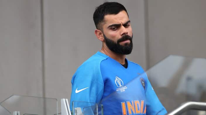 India's captain Virat Kohli reacts after their loss in the Cricket World Cup semi-final match against New Zealand at Old Trafford in Manchester, England, Wednesday, July 10, 2019. (AP Photo/Aijaz Rahi)