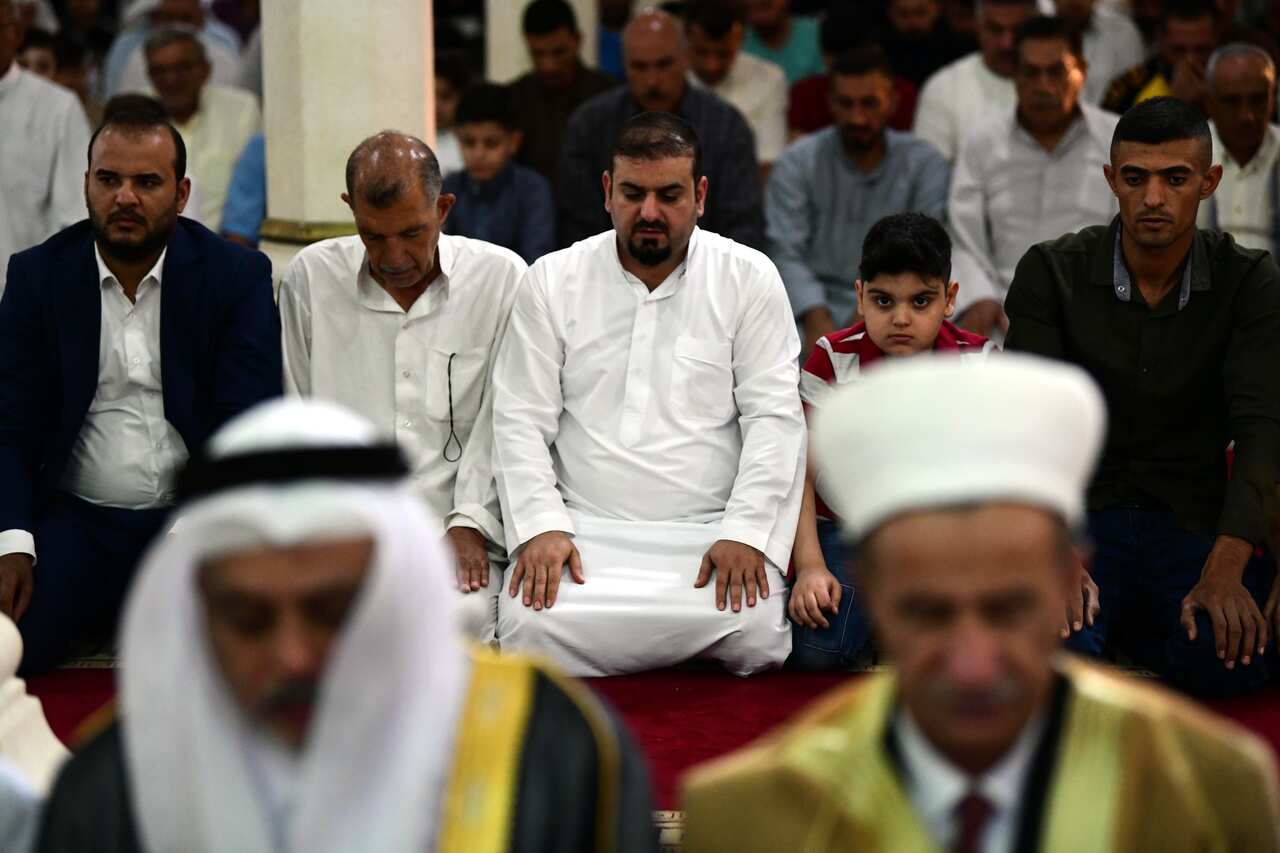 Iraqi Sunni Muslims pray during the festival of Eid al-Adha at Um Al-Tabool mosque in central Baghdad, Iraq, 11 August 2019.