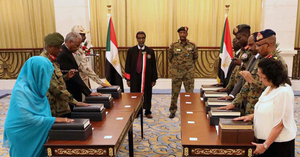 members of the newly formed transitional Council are sworn in at the presidential palace in Khartoum, Sudan, 21 August 2019.