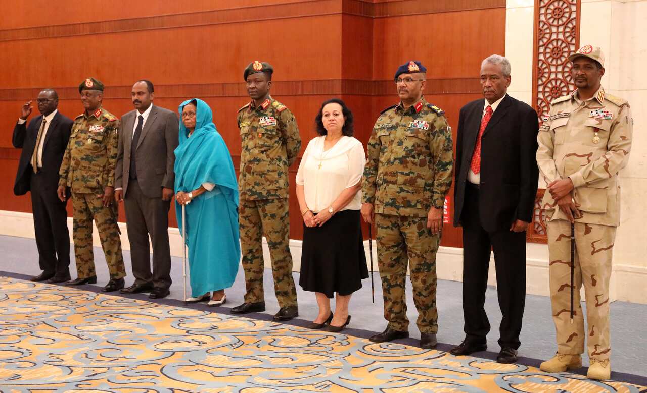 Members of Sudan's newly formed transitional Council during their sweaing-in ceremony at the presidential palace in Khartoum, Sudan, 21 August 2019.