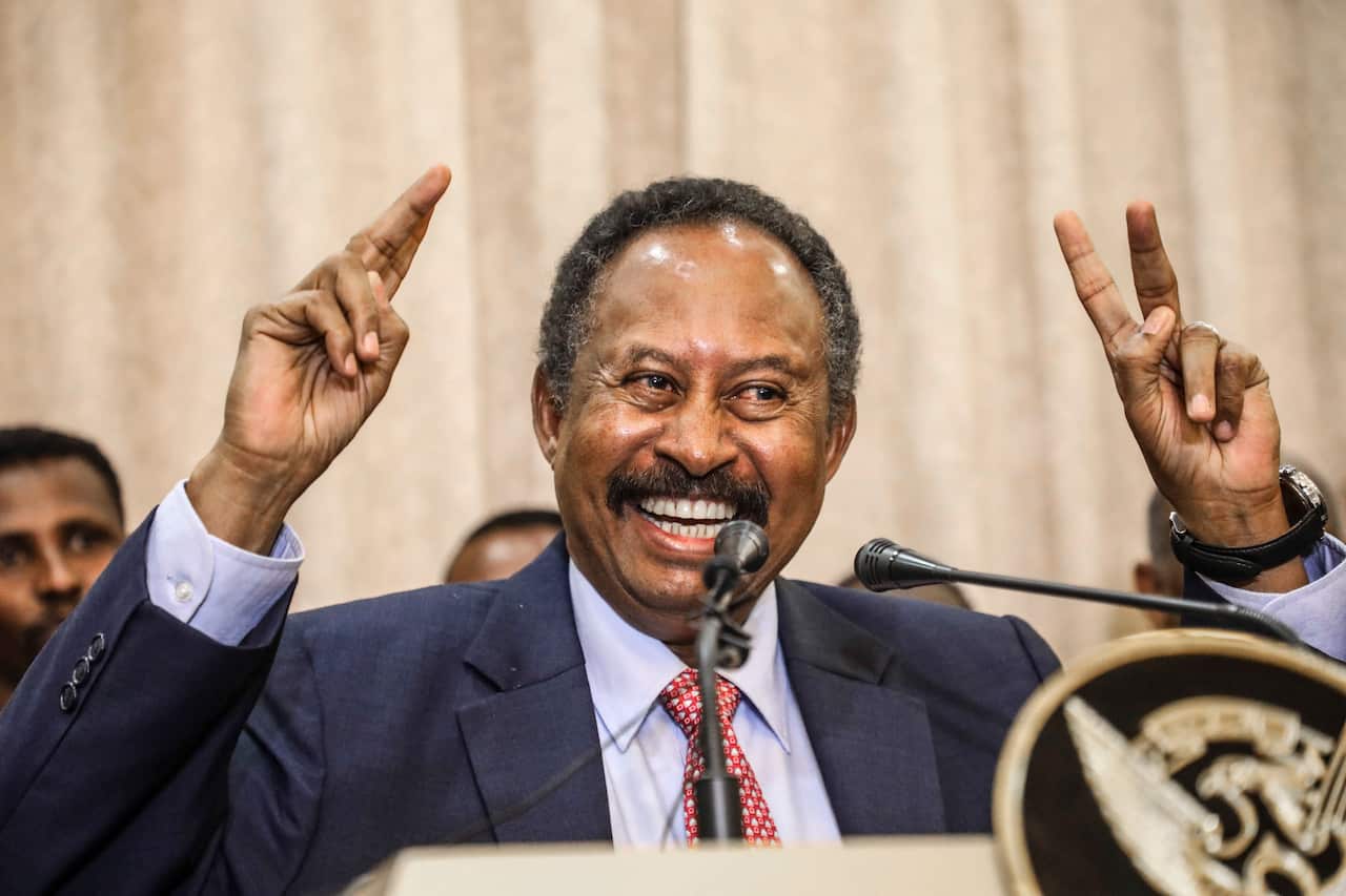 Sudan's new Prime Minister Abdalla Hamdok speaks duringa press conference in Khartoum, Sudan