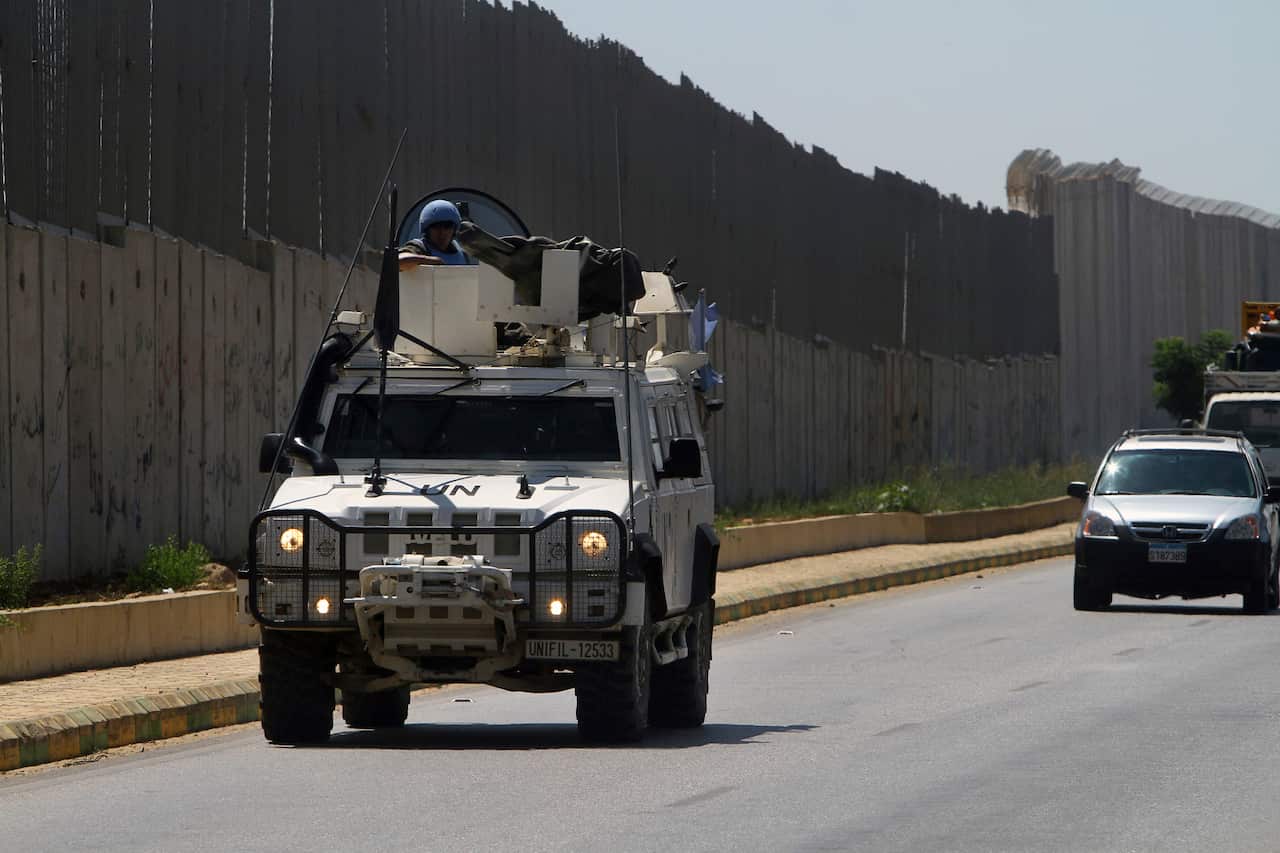 Spanish U.N peacekeepers patrol the Lebanese side of the Lebanese-Israeli border in the southern village of Kfar Kila, Lebanon