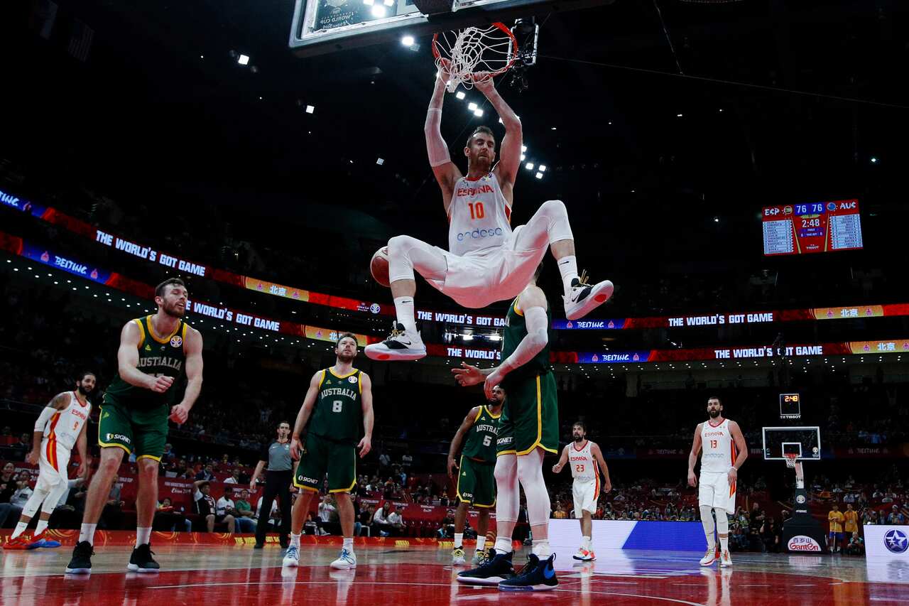 Victor Claver of Spain dunks the ball against Australia during their semifinals match for the FIBA Basketball World Cup at the Cadillac Arena in Beijing, Saturday, Sept. 13, 2019. (AP Photo/Andy Wong, Pool)