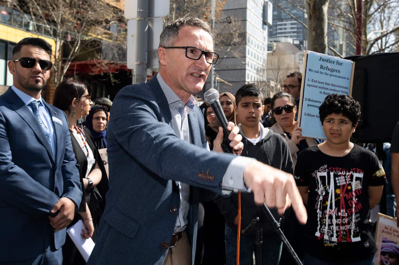 Australian Greens leader Richard Di Natale speaks during a demonstration calling for refugee rights at the Victorian State Library in Melbourne, Saturday, September 14, 2019. (AAP Image/Erik Anderson) NO ARCHIVING