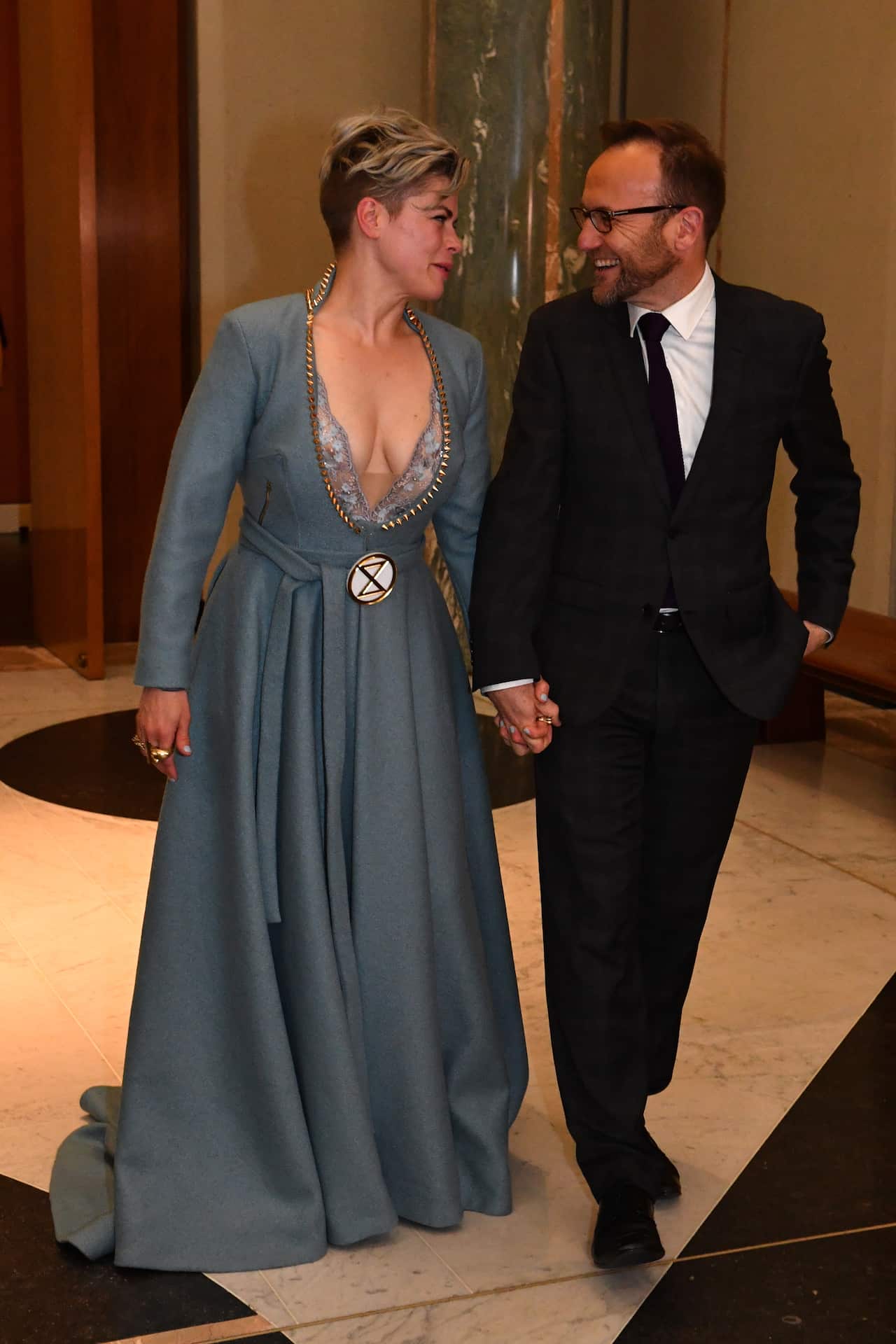 Greens Member for Melbourne Adam Bandt and wife Claudia Perkins arrive for the annual Mid Winter Ball at Parliament House in Canberra, Wednesday, September 18, 2019. (AAP Image/Mick Tsikas) NO ARCHIVING
