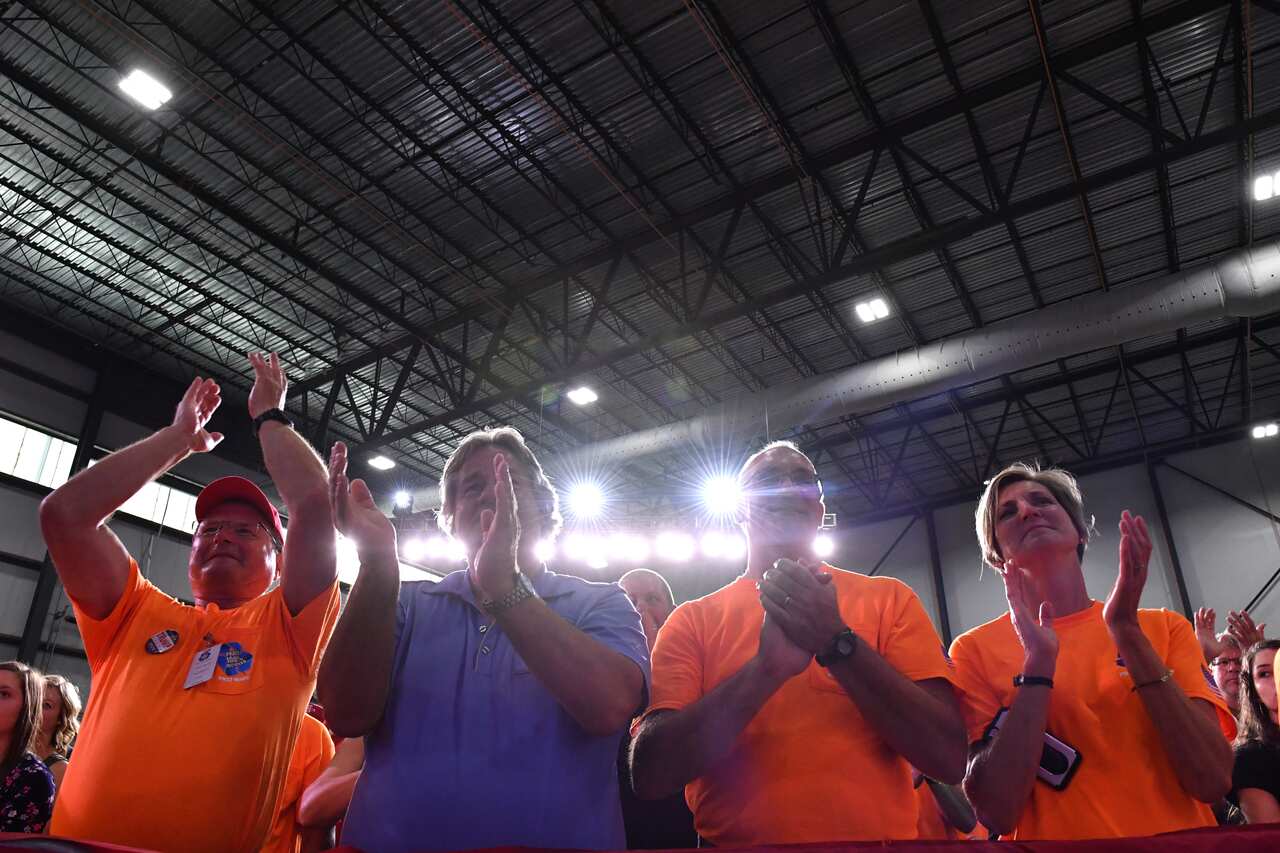 Trump supports applaud US President Donald Trump and Australia's Prime Minister Scott Morrison at the opening of Pratt Paper Plant in Wapakoneta, Ohio, United States, Sunday, September 22, 2019. (AAP Image/Mick Tsikas) NO ARCHIVING