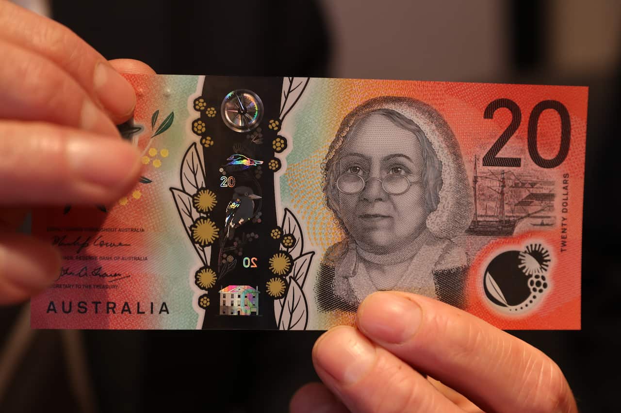 Raised bumps to facilitate the blind and low vision community are seen on Australia's new $20 note at The Reserve Bank of Australia in Melbourne 