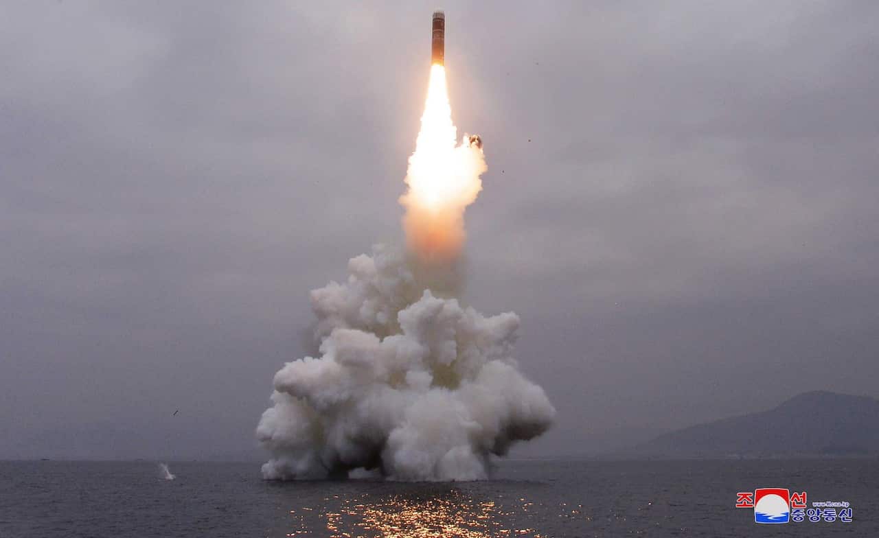 A photo released by the official North Korean Central News Agency (KCNA) shows the successful launch from a submarine of a Pukguksong-3, a new-type ballistic missile by the Academy of Defence Science of the Democratic People's Republic of Korea, in the wa