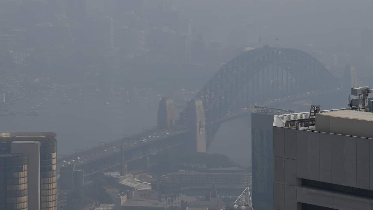 Smoke haze from bushfires in New South Wales blankets the CBD and Sydney Opera House in Sydney