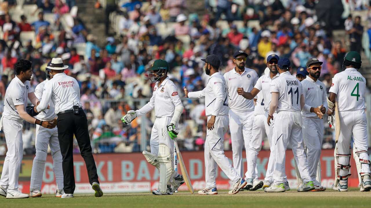 Indian team members shake hands after winning the second match and test series against Bangladesh in Kolkata, India, Sunday, Nov. 24, 2019. (AP Photo/Bikas Das)