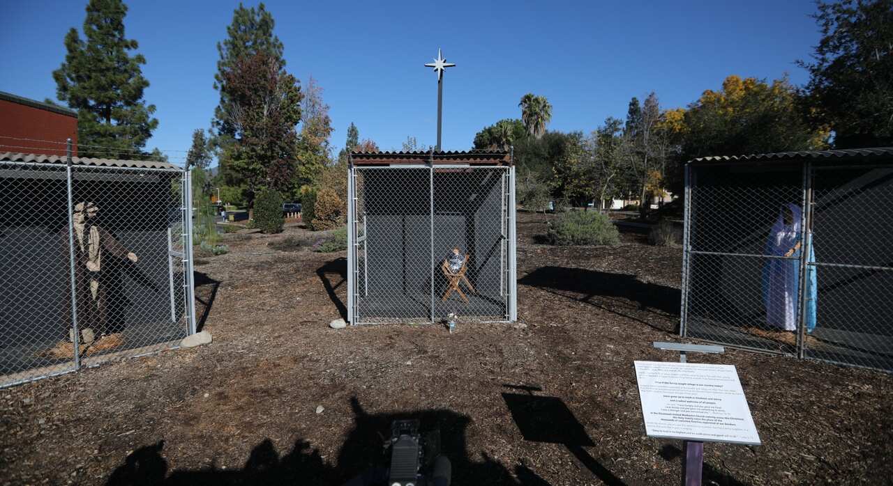 A view of cages with statues of Jesus, Mary, and Joseph, Claremont, California