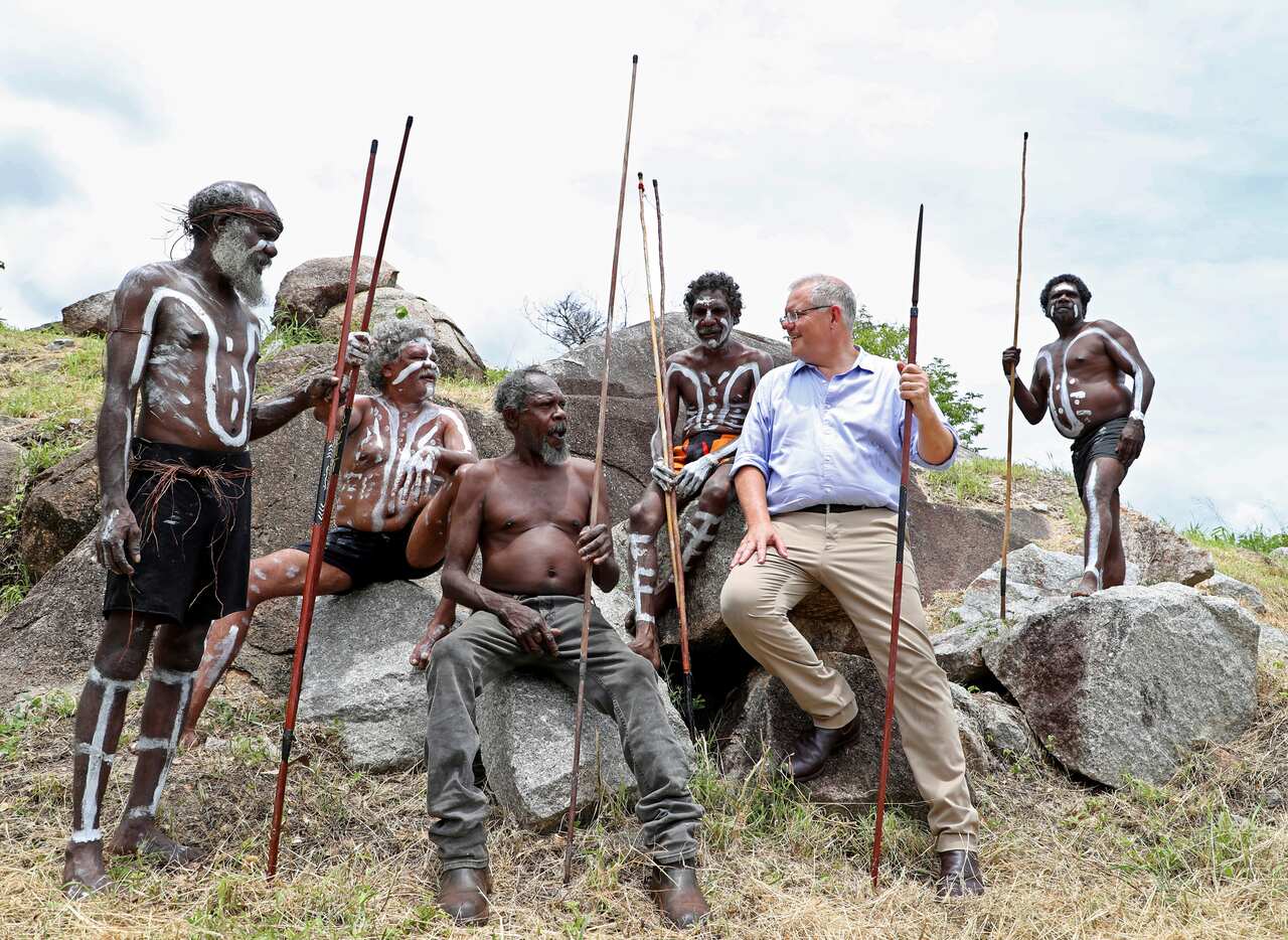 Prime Minister Scott Morrison with the people of the Guugu Yimithirr tribe at Reconciliation Rocks, Cooktown, Tuesday, January 22, 2019