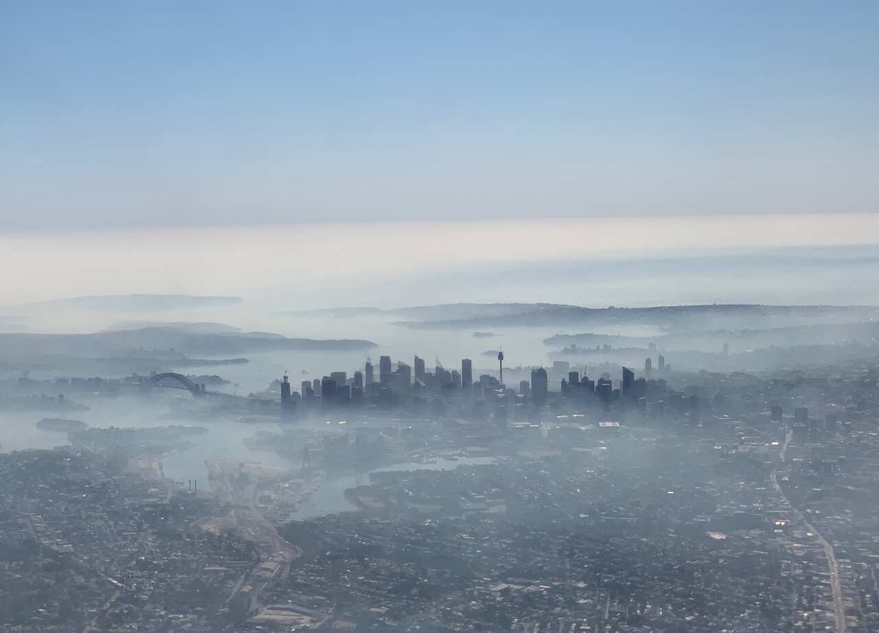 In an image taken on a smart phone from a plane window, shows smoke haze blanketing Sydney, Tuesday, November 19, 2019.