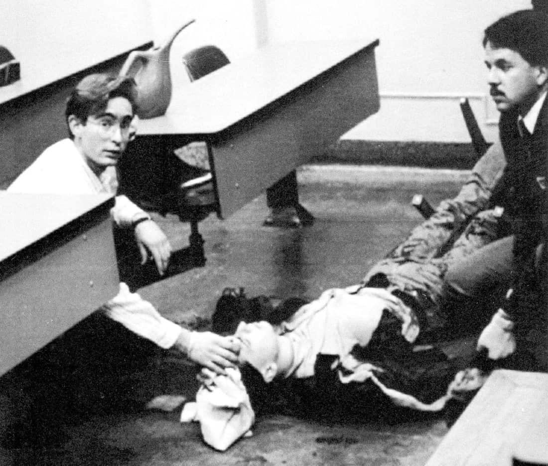 A student is tended to in a classroom at the University of Montreal, Dec. 6, 1989, where a gunman opened fire killing 14 women before turning the gun on himself.