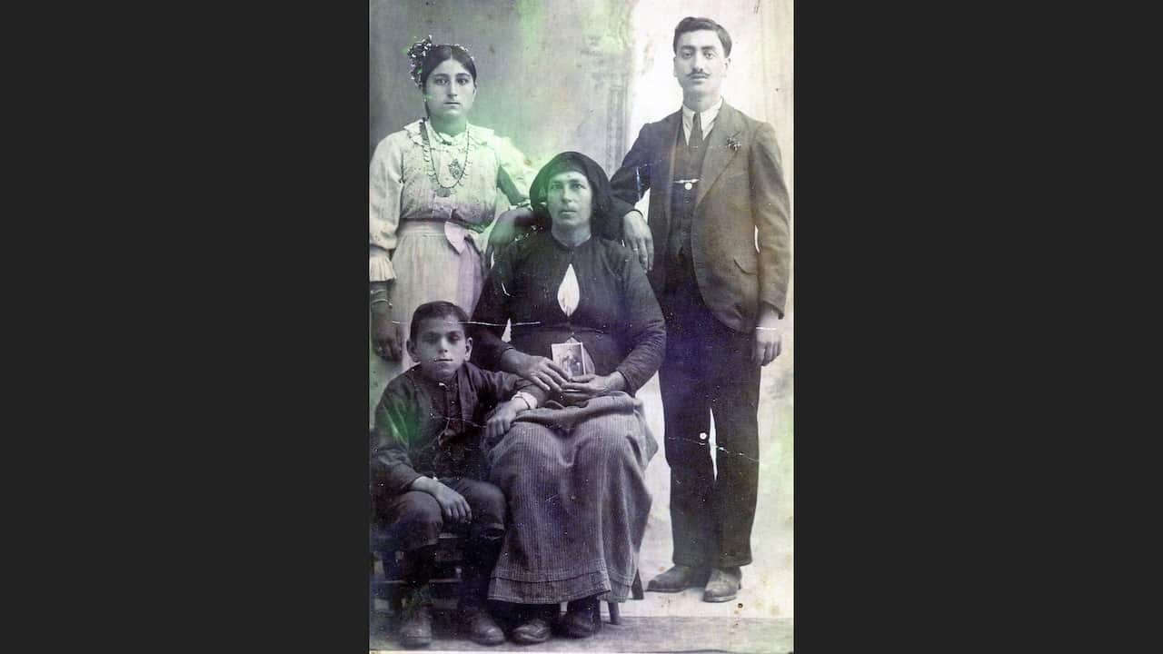 Maria's grand-mother Eleni (seated) and Maria's father George, her mother Dimitra and an unknown boy. 