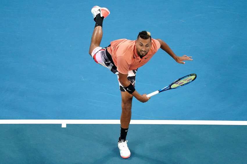 Nick Kyrgios serves during his first round match against Lorenzo Sonego of Italy on day two of the Australian Open tennis tournament at Melbourne Arena. 