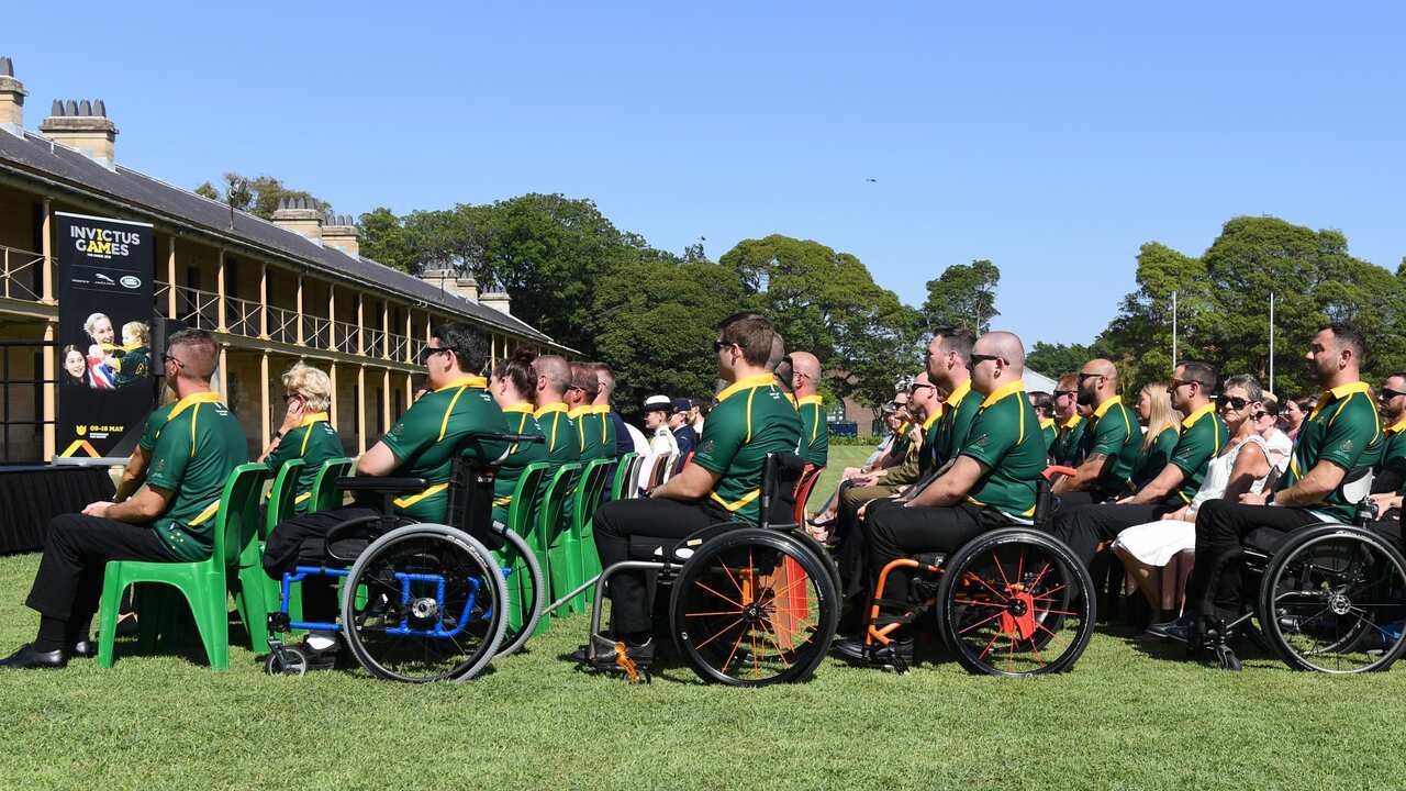 Competitors listen during the Invictus Games 2020 team announcement in Sydney, Tuesday, February 18, 2020.