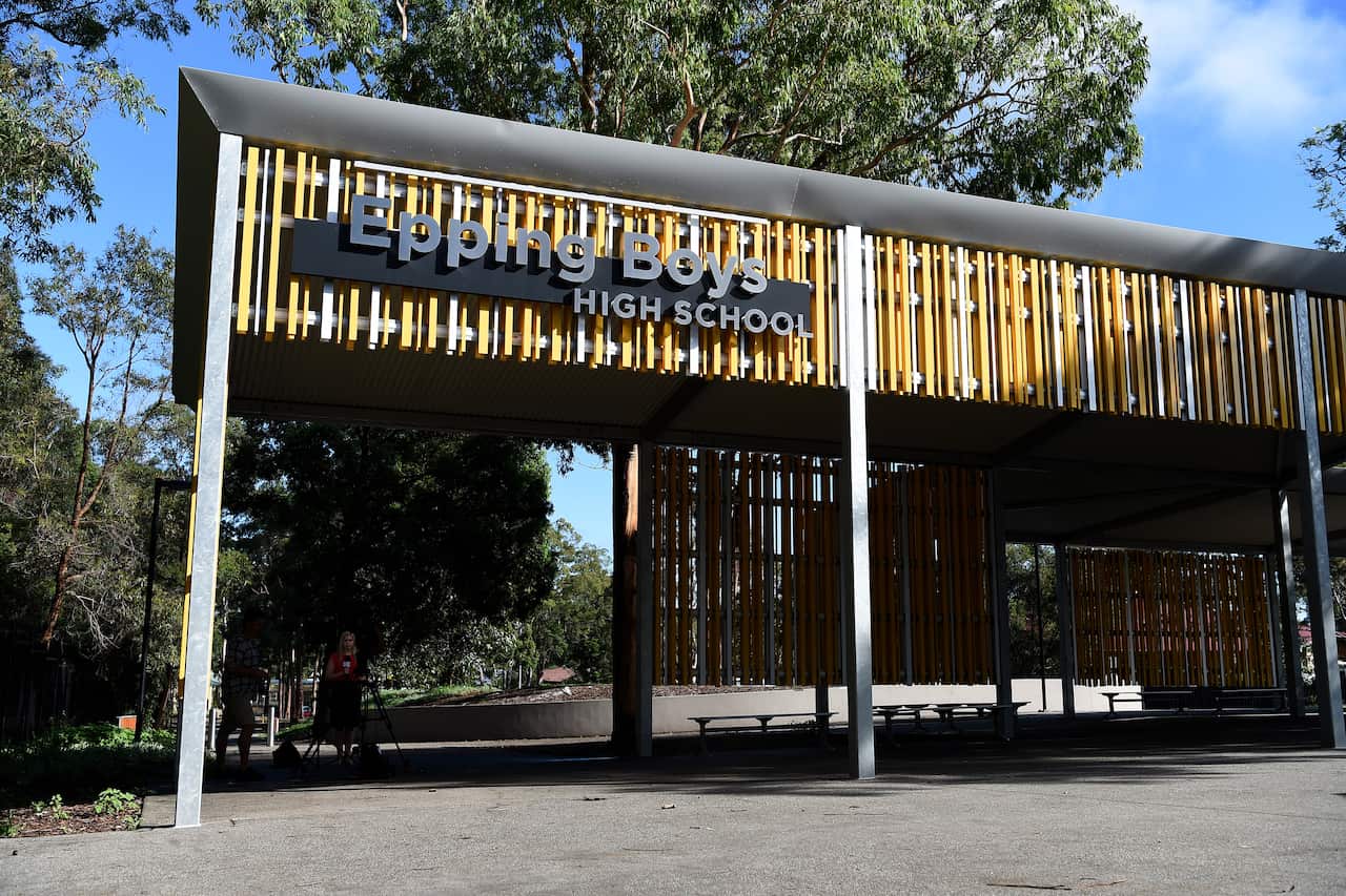 Signage at Epping Boy's High School in Sydney, Friday, March 6, 2020. Epping Boy's High School has been forced to shut down today after a year 11 student tested positive to Covid-19. (AAP Image/Bianca De Marchi) NO ARCHIVING