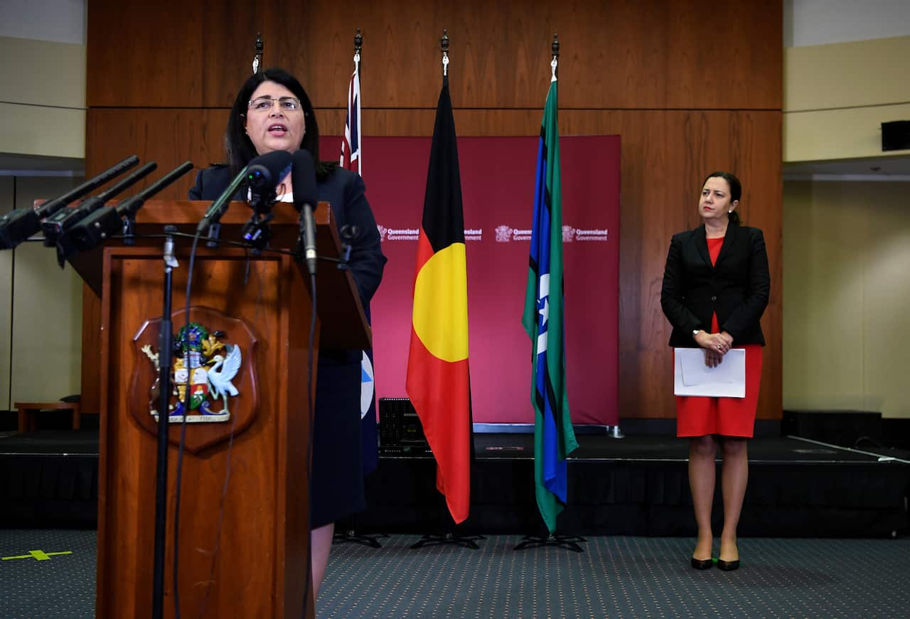 Queensland Minister for Education Grace Grace (left), watched by Premier Annastacia Palaszczuk,