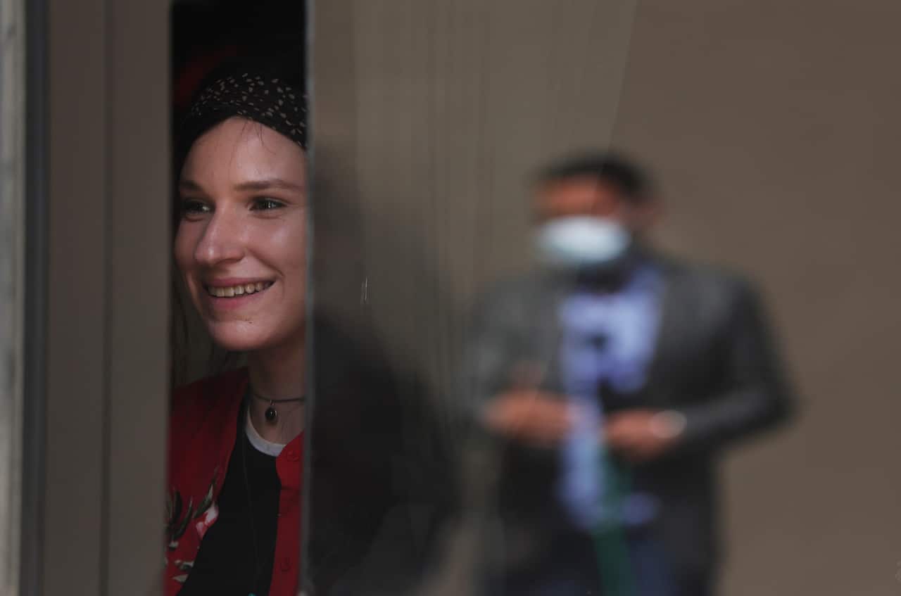 Hundreds of Australians stranded in Nepal for weeks leave on repatriation flight. Nepals prime minister to decide on extending lockdown that is scheduled to end tomorrow after 45 days of closure.  (AP Photo/Niranjan Shrestha)