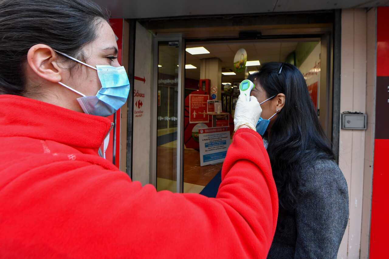 Cannes equipped 20 busy grocery stores with infrared thermometers. In case of fever (38 C) the person is asked to go home and contact a doctor. (Photo by Lionel Urman/Sipa USA)